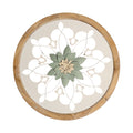 Carved wood round wall art frame with natural wood and white wash finish featuring intricate floral design