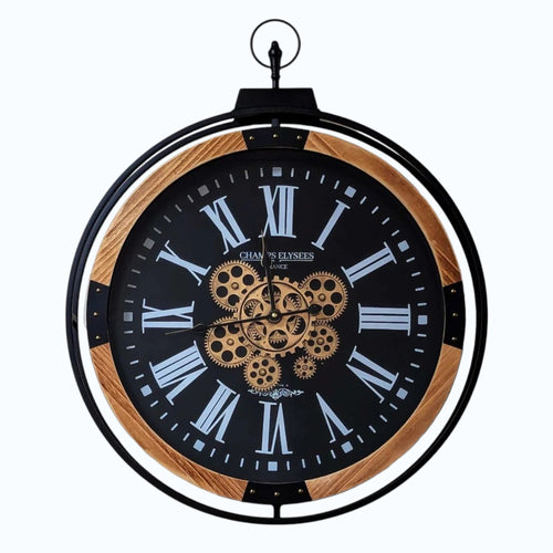 Champs Elysees industrial gear wall clock close-up showing Roman numerals and gold gears