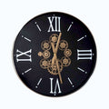 Industrial wall clock with moving gold gears and black face