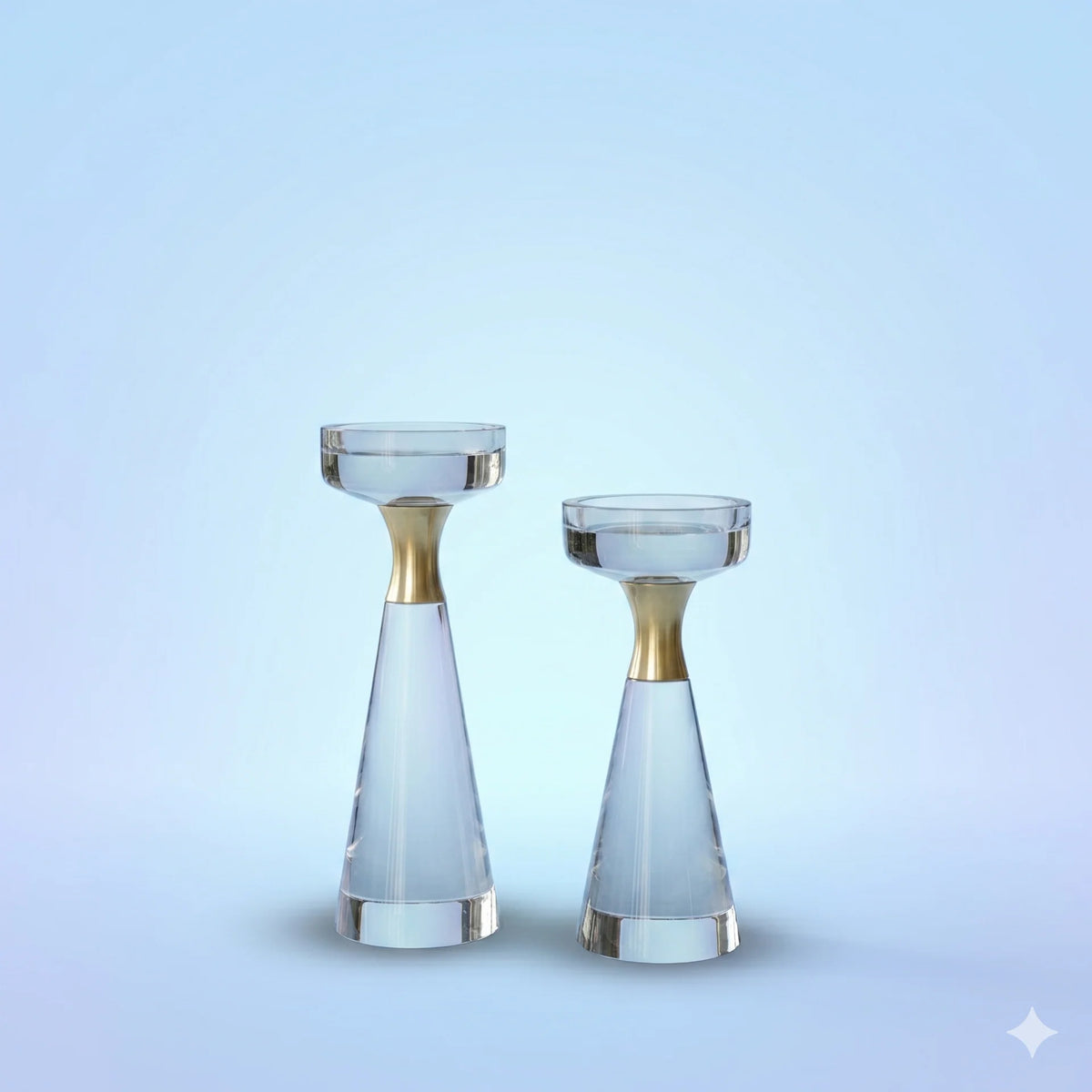 Set of two azure matte crystal and gold taper holders on light blue background
