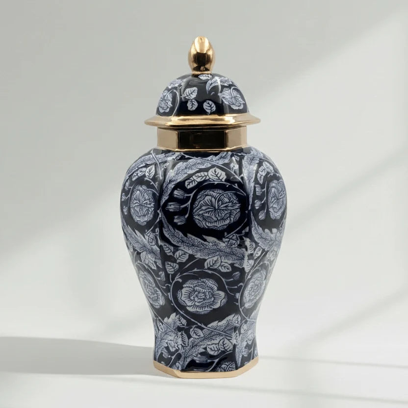 Navy floral ceramic ginger jar with gold accents on white background