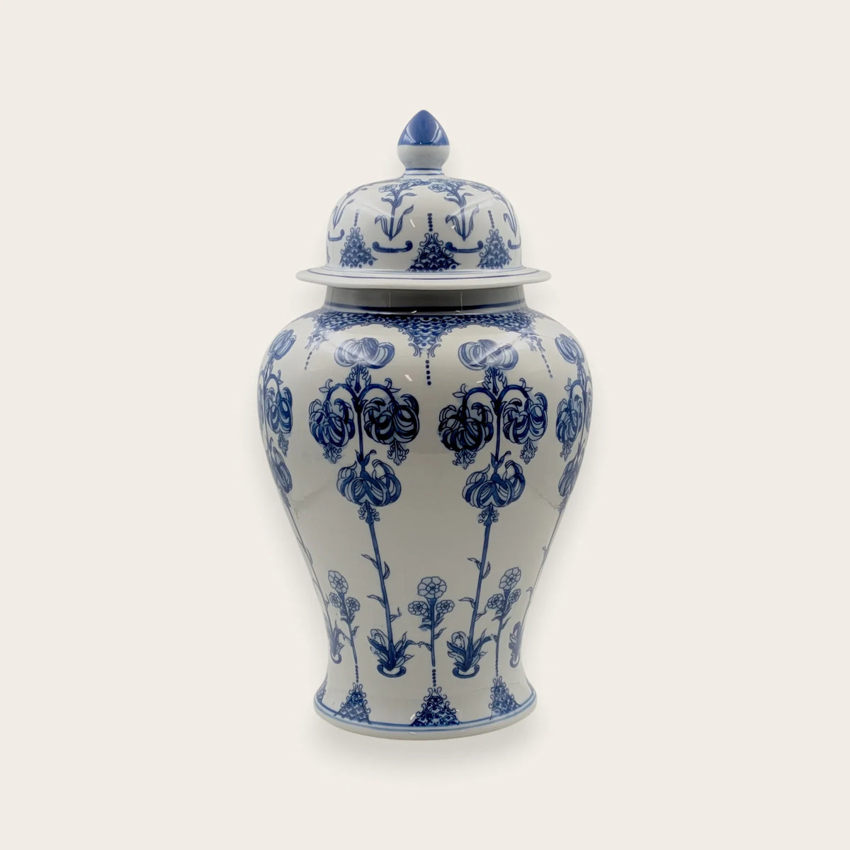 Blue and white ceramic ginger jar with floral pattern and lid, 38cm tall