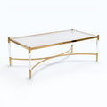Rectangular glass coffee table with mirror-polished gold frame and clear acrylic legs