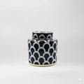 Ceramic jar with black and white high-gloss finish and metallic gold trim