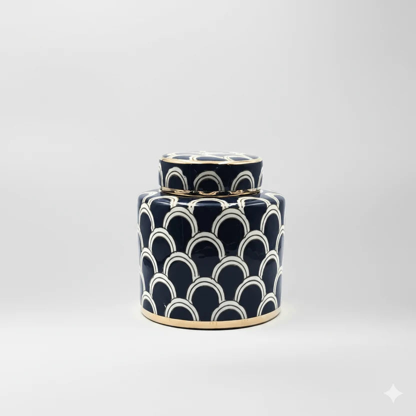 Ceramic jar with black and white high-gloss finish and metallic gold trim