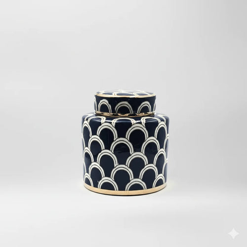 Ceramic jar with black and white high-gloss finish and metallic gold trim
