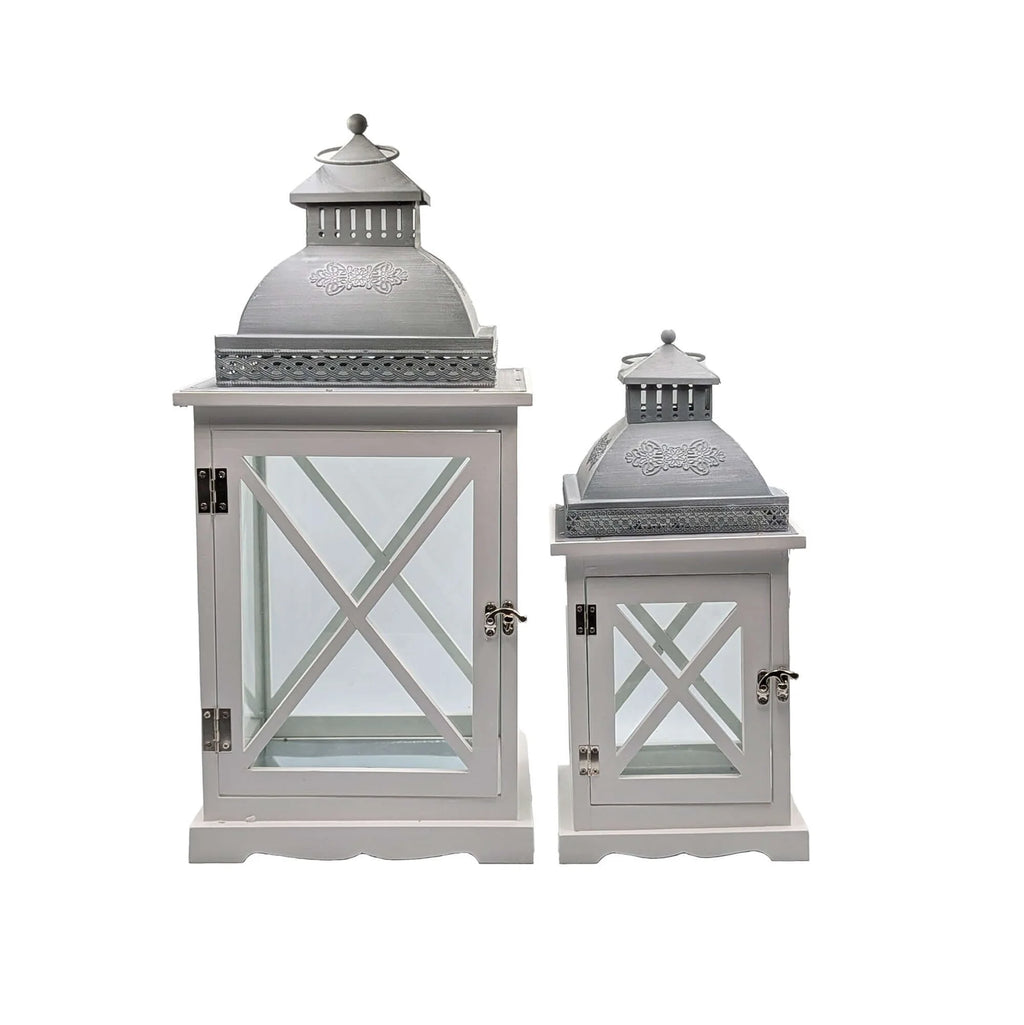 Set of two antique white wooden lanterns with glass panels and metal domed tops
