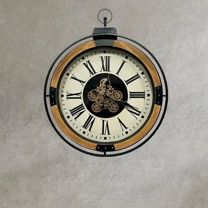 Champs Elysees gearmoving clock mounted on a grey wall